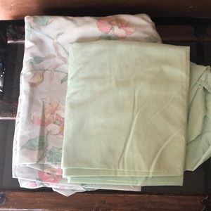 One green full size fitted sheets. One blue pink queen fitted floral.